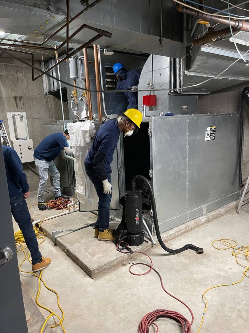 Marine HVAC cleaning crew on site